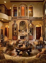 Our tuscan decorating ideas will inspire you to fill your entire home with tuscan style. View Of High Volume Living Room In Neutral Tones From Behind The Sofa Tuscan Living Rooms Tuscan Decorating Tuscan House