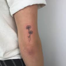 You can find daisy tattoos of various colors by many people. Top 107 Best Daisy Tattoos 2021 Inspiration Guide Daisy Tattoo Tricep Tattoos Daisy Flower Tattoos