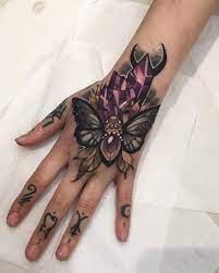 7 771 Likes 62 Comments Olie Siiz Olie Siiz On Instagram I Love My New Pink Machine F Hand Tattoos For Women Butterfly Tattoos For Women Jewel Tattoo