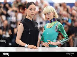 Arisa Nakano, left, and Aoi Yamada pose for photographers at the photo call  for the film 'Perfect Days' at the 76th international film festival,  Cannes, southern France, Friday, May 26, 2023. (Photo
