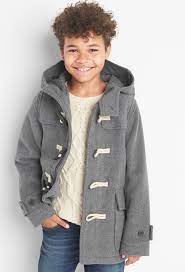 2 poches extérieures et 1 poche intérieure. Duffle Coat En Laine Gris Kid Canaille