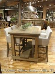 A patio table is made from cedar and has a rectangular planter sunken into the middle. Rectangular Bar Height Table Ideas On Foter