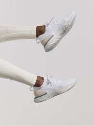 Nike Wmns Nike Epic React Flyknit Pure Platinum Pure Platinum Particle Beige Celesti Sneakers All Nike Shoes Nike Shox Shoes Workout Shoes