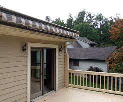This Roof Mount Awning Is Attractive Even When Rolled Up Patio Cool House Designs Backyard Shed