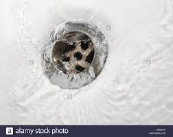 bathroom sink plug hole stock photo