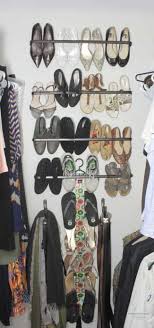 This is a great idea for a kids closet too, continue reading. Small Closet Shoe Organization With Curtain Rods