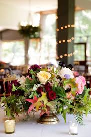Erin Mayer And Jacob Isaacson S Rustic Austin Wedding At Pecan Grove Austin Wedding Floral Centerpieces Pecan Grove