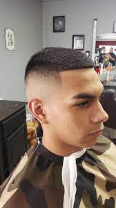 Bald fade haircuts for men feature short cropped sides, with more hair on top. High Bald Fade Barber