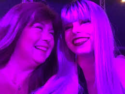 Hi I love this photo of me and my daughter. Can someone please make it more  clear. Thank you