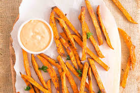 You may need two cookie sheets depending on how big the cookie sheets are bake at 425 for 30 to 45 minutes flipping and rotating fries every 10 or so minutes until crisp. Sweet Potato Fries With Paprika Garlic Aioli Delicious Meets Healthy