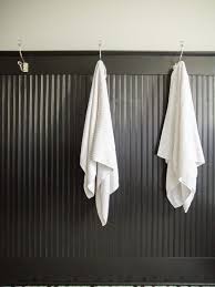 In between each wood plank is a little indentation or ridge, also known as a bead. Black Beadboard Transitional Bathroom Kristin Petro Interiors Beadboard Bathroom Beadboard Wainscoting Wainscoting Bathroom