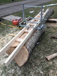 Chain Saw Mill From Up Cycled Crutches And Unistrut Chainsaw Mill Homemade Chainsaw Mill Wood Shop Projects