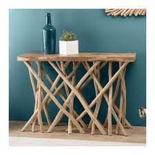 Console en bois massif aspect vieilli disposant d'un plateau rectangulaire. Console En Bois De Teck Et Bois Flotte Pour Une Entree Au Style Unique