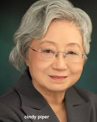 Debbie Fiderer as Ernestine the operator from Laugh-In