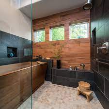 As if to contrast with the previous design, this one is extremely modern. Japanese Inspired Wet Room Bath Shower Wooden Tub Japanese Bathroom Design Bathroom Design Bathtub Design