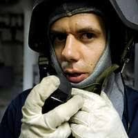 Lt. j.g. Tomas Hernandez stands junior officer of the deck watch during a  Flag Officer Sea Training