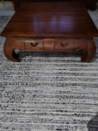 The opium coffee table brings the timeless style of a chinese sculptured beauty of teak, bathed in a washed brown hue. Teak Wood Opium Coffee Table Furniture Tables Chairs On Carousell