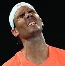 Greece's stefanos tsitsipas (r) shakes hands with rafael nadal after their australian open match. Esug9d327tzoem