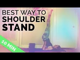 How To Do Shoulder Stand Safely Shoulder Stand Yoga Pose Tutorial Salamba Sarvangasana Shoulder Stand Yoga Free Yoga Videos Yoga Tutorial