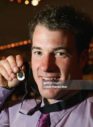 Julian Field of North Ballarat poses with his trophy after winning... News  Photo