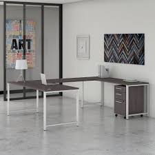 You'll have more desk space for a standing desk. Bush Business Furniture 400 Series 72w U Shaped Desk With 3