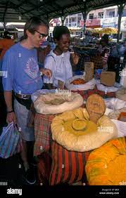 French people, adult man, adult woman, interracial couple, couple,  shoppers, shopping, Central Market, Pointe-a-Pitre, Guadeloupe, France  Stock Photo - Alamy