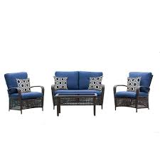 Metal, wicker and wood are materials options available in patio dining sets. Hampton Bay Delaronde 4 Piece Dark Brown Wicker Patio Chat Set With Navy Cushions The Home Depot Canada
