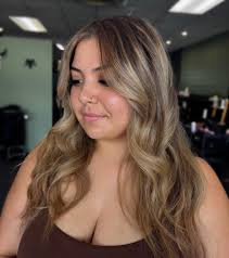 ✨ She wanted to go just a smidge darker — softening the blonde for a more  natural look 🌤️ We added depth and dimension while still keeping those  beachy waves full of