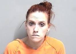 Armed woman allegedly steals two vehicles, brings drugs into jail