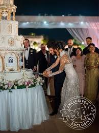 See Priyanka Chopra And Nick Jonas 7 Tier Wedding Cake Inspired By The Palace Where They Wed Priyanka Chopra Wedding Celebrity Weddings Wedding Dresses