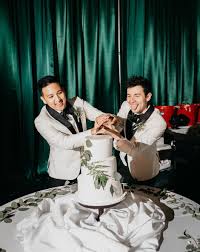 Industrial Wedding In An Airplane Hangar With Plants & Cambodian Outfits