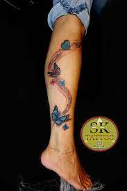 Butterfly With Kids Names Tattoo Butterfly Leg Tattoos Leg Tattoos Butterfly Tattoos For Women
