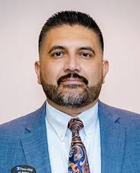 Three-Way Cadillac Staff