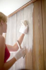 How To Whitewash Wood Paneling In A Few Simple Steps Wood Paneling Makeover Paneling Makeover Painting Wood Paneling