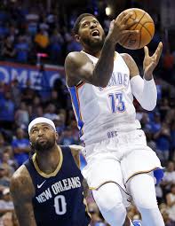 Oklahoma City S Paul George 13 Takes The Ball To The Hoop Past New Orleans Demarcus Cousins 0 In The First Qua Paul George Okc The Oklahoman Paul George