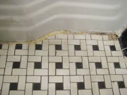 Clean Vintage Bathroom Tiles Caulk More Cleanly With Painter S Tape Vintage Bathroom Tile Tile Bathroom Yellow Bathroom Tiles