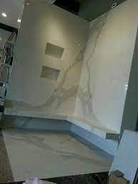 Porcelain Slabs On The Walls Of This Shower No More Grout Lines What A Terrific Product Bathroom Remodel Master Shower Remodel Shower Wall