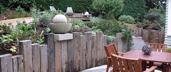 Recycled Sleeper Retaining Wall And Screen Matched With Australian Natives Description Fro Sleeper Retaining Wall Sleepers In Garden Backyard Retaining Walls