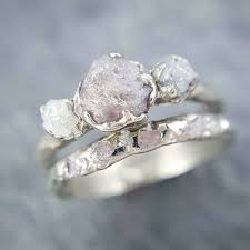 17 Raw Stone Engagement Rings That Will Appeal To The Offbeat Bride Raw Stone Engagement Rings Stone Engagement Rings Cool Wedding Rings