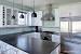 Steel Grey Leathered Granite With White Cabinets
