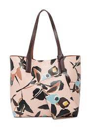 The brand's crisp colours, funky prints and playful. Kate Spade New York Abstract Print Reversible Leather Tote Nordstrom Rack
