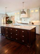 A contrasting island should take some style cues from other kitchen features so it fits seamlessly into the space. 17 Best White Cabinets Dark Island Kitchen Ideas Kitchen Design Kitchen Remodel New Kitchen