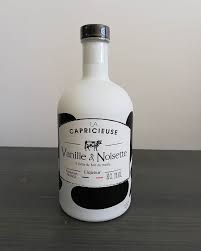 Nouveau A La Maison Du Fromage Creme De Whisky Au Lait De Vache A Deguster Sur Un Lit De Glacons Lacapricieuse Maisondufromage Pou Vodka Bottle Vodka Bottle