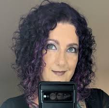 Nearly 2,000 people filled Rosa Parks Circle in downtown Grand Rapids  Saturday to mark International Women's Day.