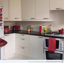While red kitchen design ideas are not that popular, less than 11,350 out of 900,000 kitchens surveyed were red, and it is a bold color choice. A Collection Of 18 White Kitchen Cabinet Designs Home Design Lover White Kitchen Accessories Red Kitchen Accessories Kitchen Cabinet Design