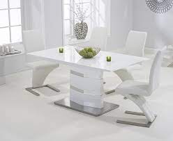 So, it works for those that are going for an ultra modern and sleek vision.{found. Mark Harris Springfield White High Gloss Dining Table And 4 Hereford White Chairs Cfs Furniture Uk