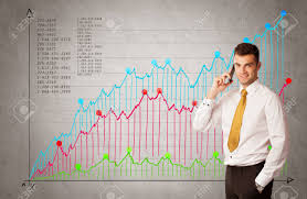 A Confident Young Businessman Standing In Front Of A A Chart