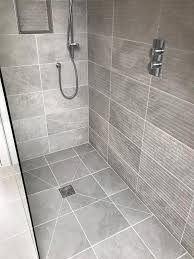 Today's shower floor tile ideas and designs are crafted with the bespoke gentleman in mind, the man who prefers briskness over basking, but never at the expense of taste. Bathroom Tile Flooring Ideas For Water Flow Wet Room Drain Engineering Discoveries In 2021 Bathroom Construction Wet Rooms Tile Bathroom