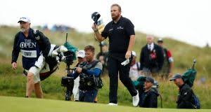 Shane lowry shares a laugh with his caddie bo martin at the saudi international. Lowry Calls The Shots To Share Halfway Lead At British Open