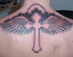 There's plenty of canvas space to work with and to implement detail and artistic creativity. Winged Cross In Sky Back Tattoo Tattooimages Biz